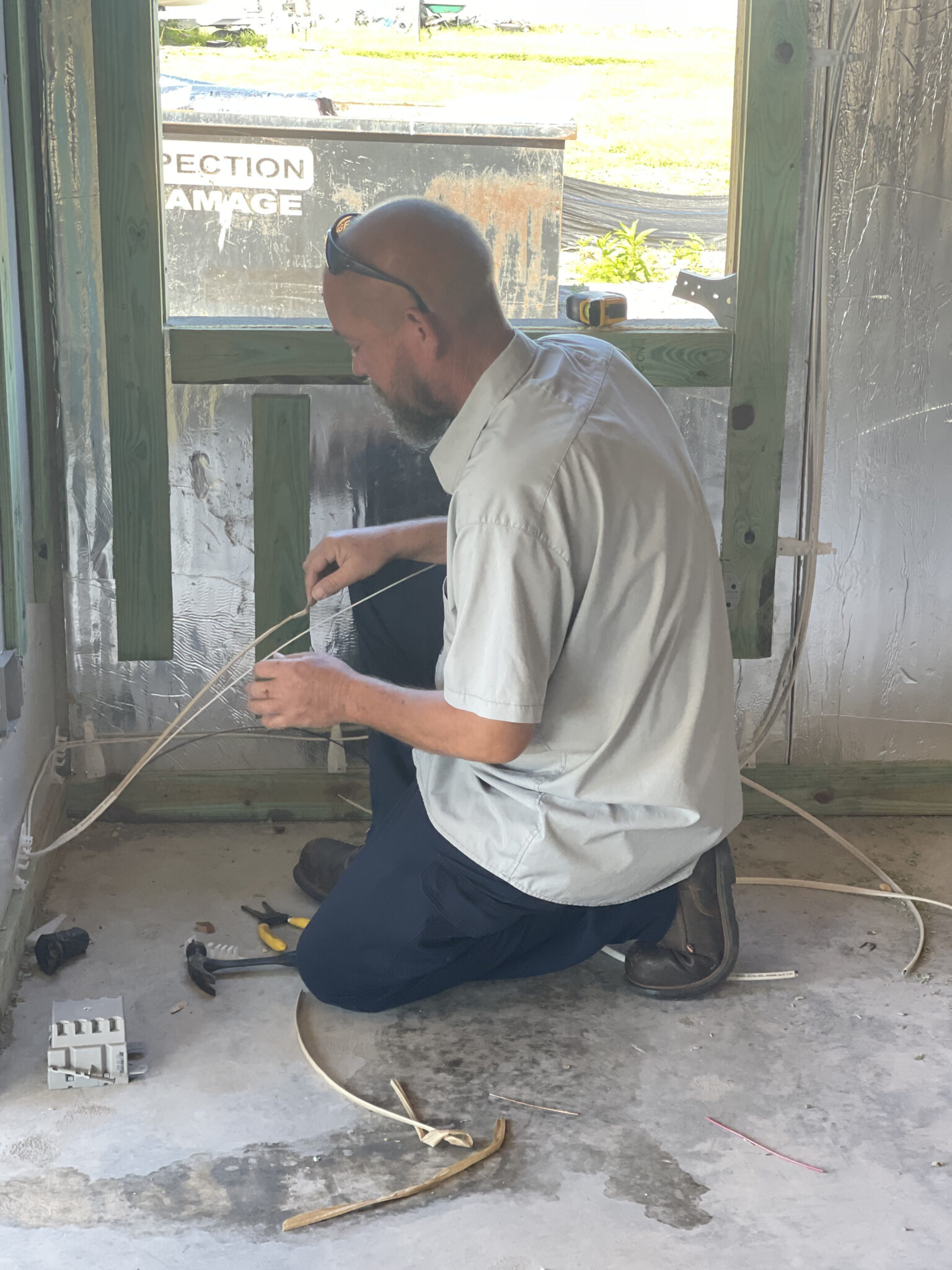 Boyd Brothers electrician working on a new residential property in Southwest Florida