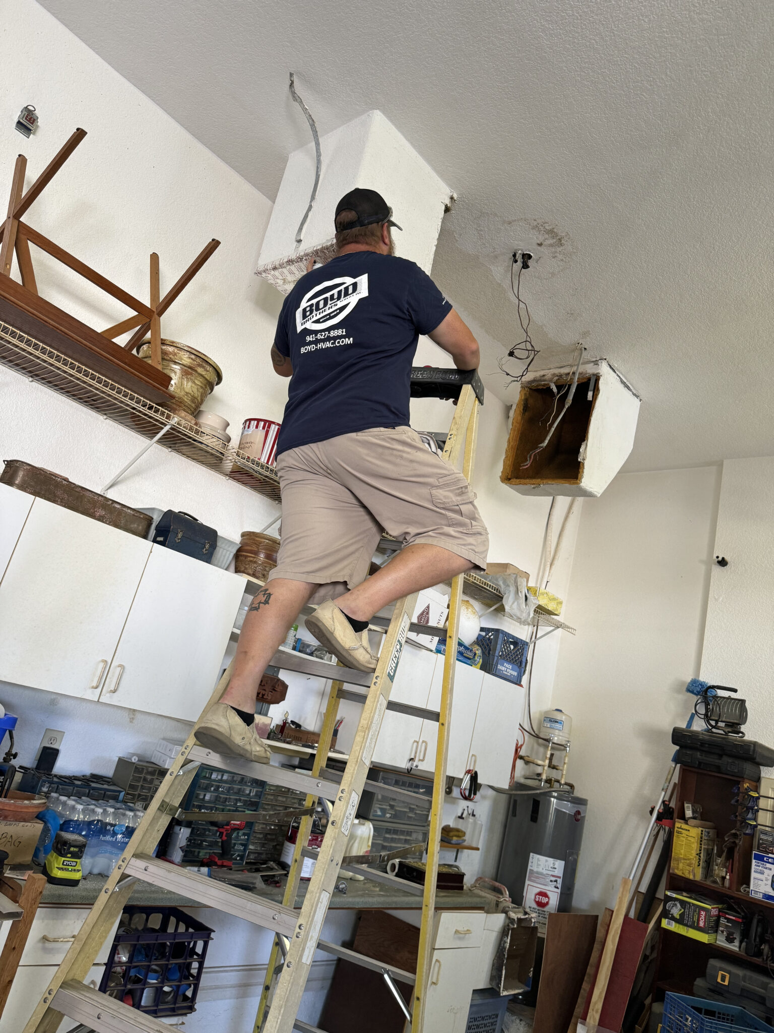 Boyd Brothers technician installing an AC unit at a customer’s home in Southwest Florida
